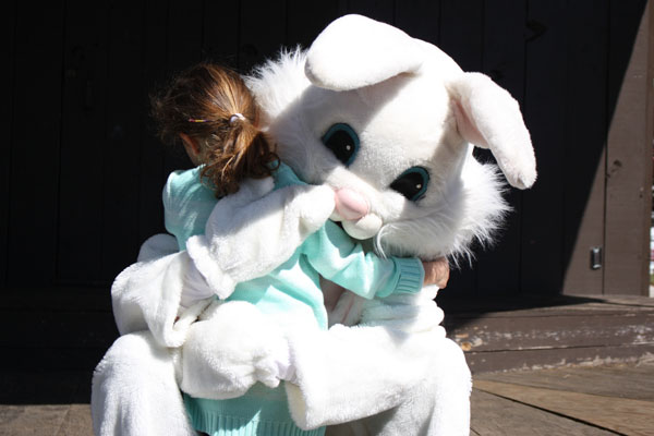 Little Mallori Waldron, Age 4, raced back after her meet and greet to give the Easter Bunny a hug.